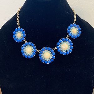 Blue sunburst jeweled necklace